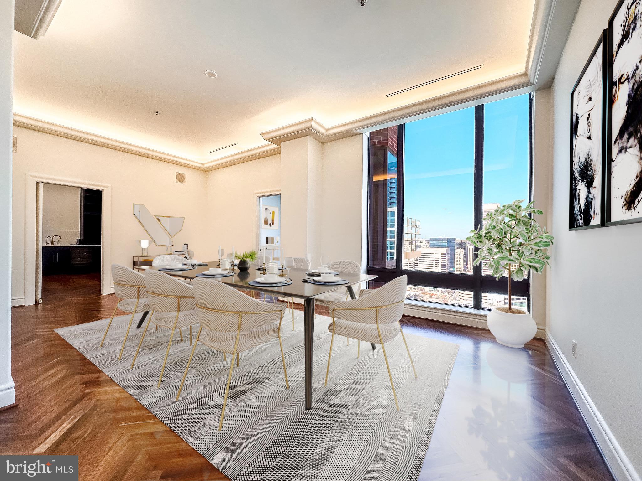 10 East Lee Street, Unit 2701 Baltimore, MD 21202 - Photo 26 of 58 a living room with furniture and a large mirror