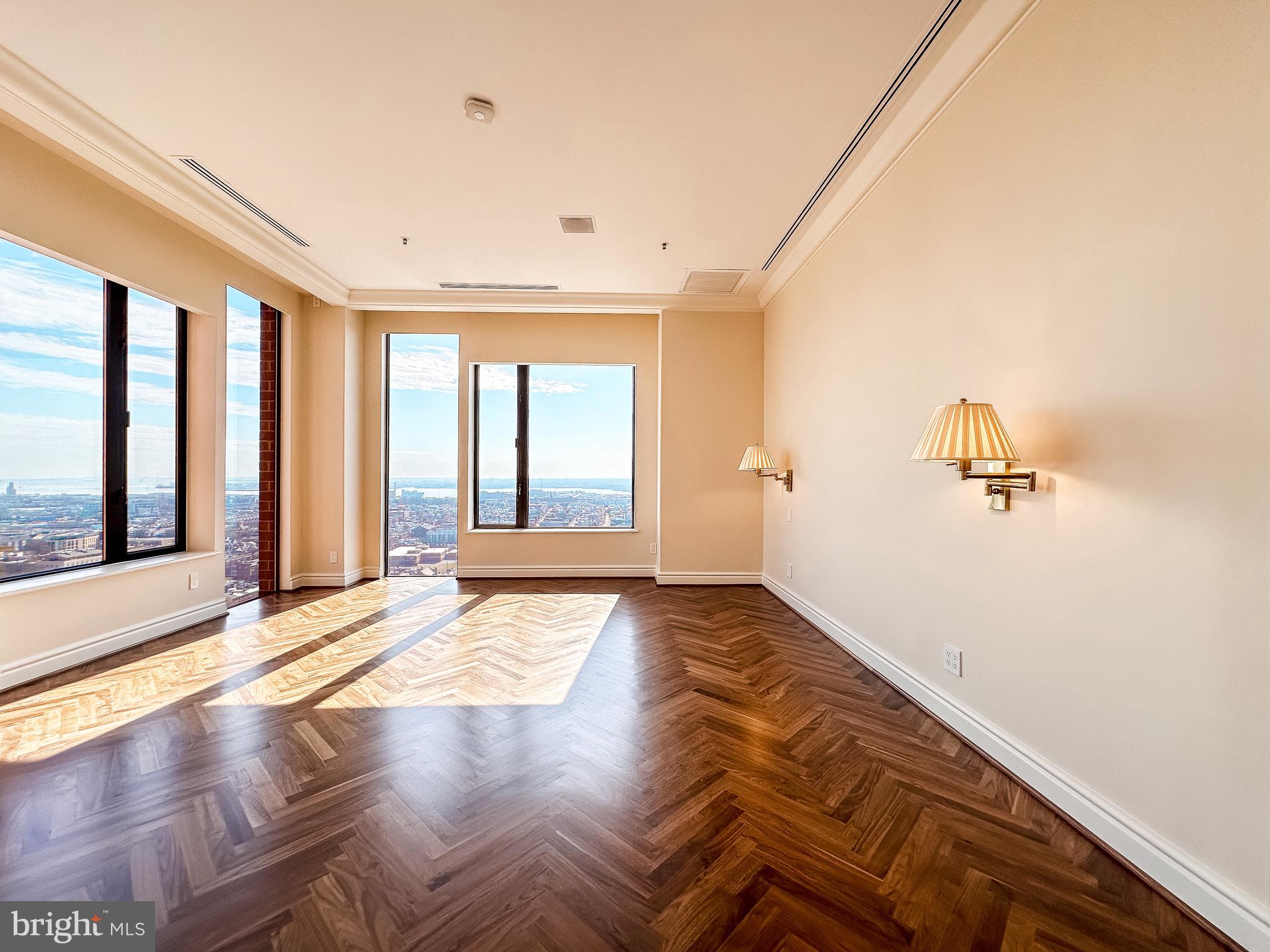 10 East Lee Street, Unit 2701 Baltimore, MD 21202 - Photo 34 of 58 a view of an empty room with a window
