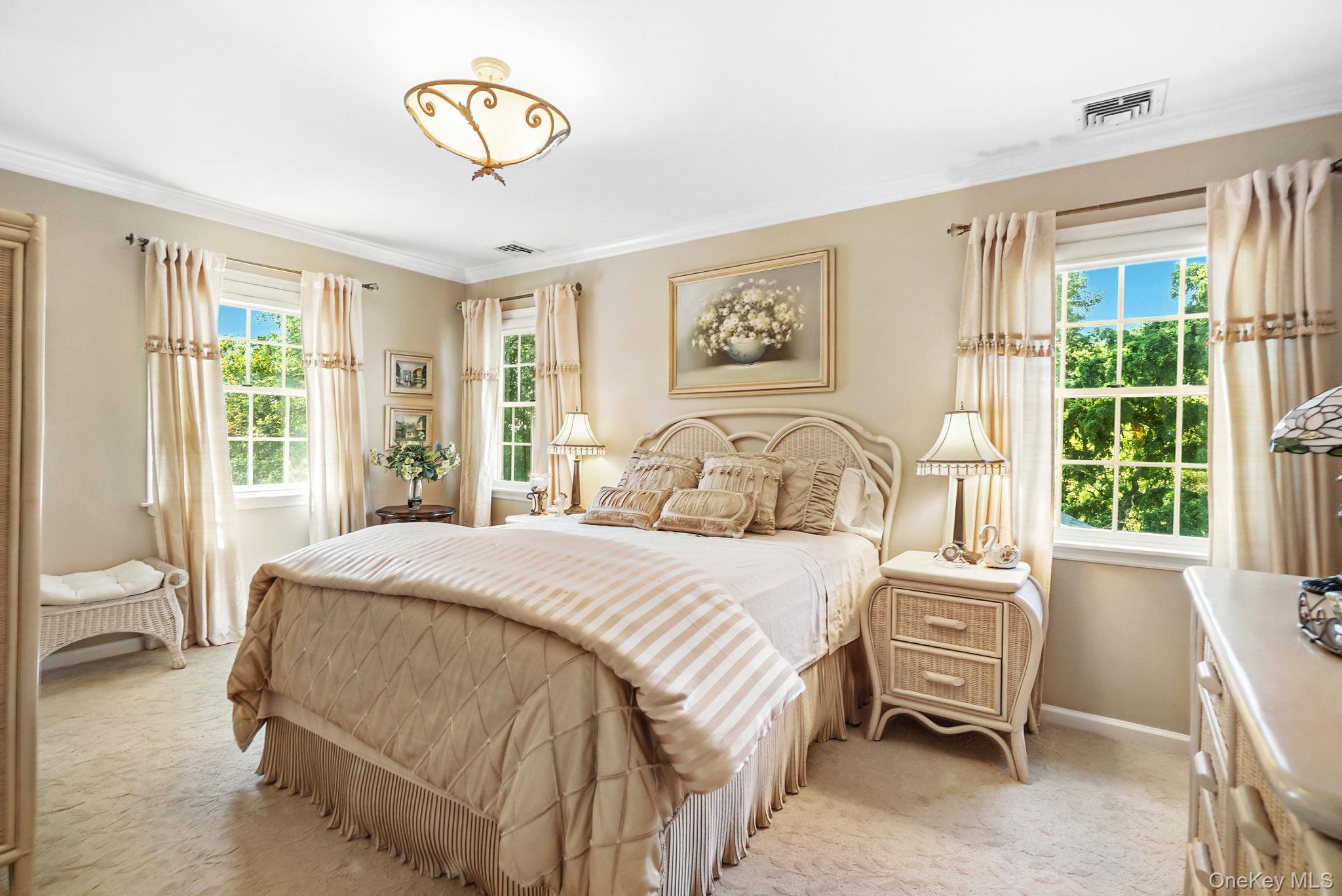 33 Hevelyne Road Elmsford, NY 10523 - Photo 21 of 43 Carpeted Bedroom featuring ornamental molding