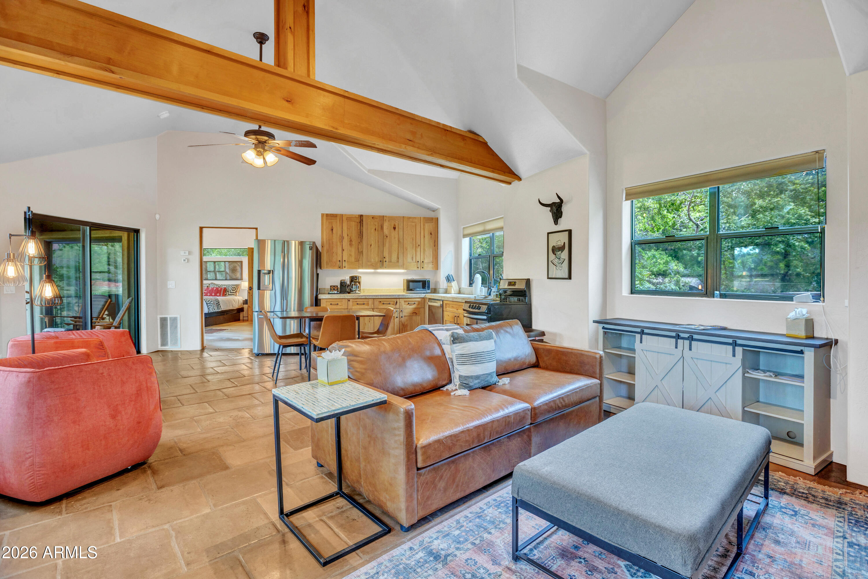 55 Ranch House Circle Sedona, AZ 86336 - Photo 42 of 61 a living room with furniture and a large window