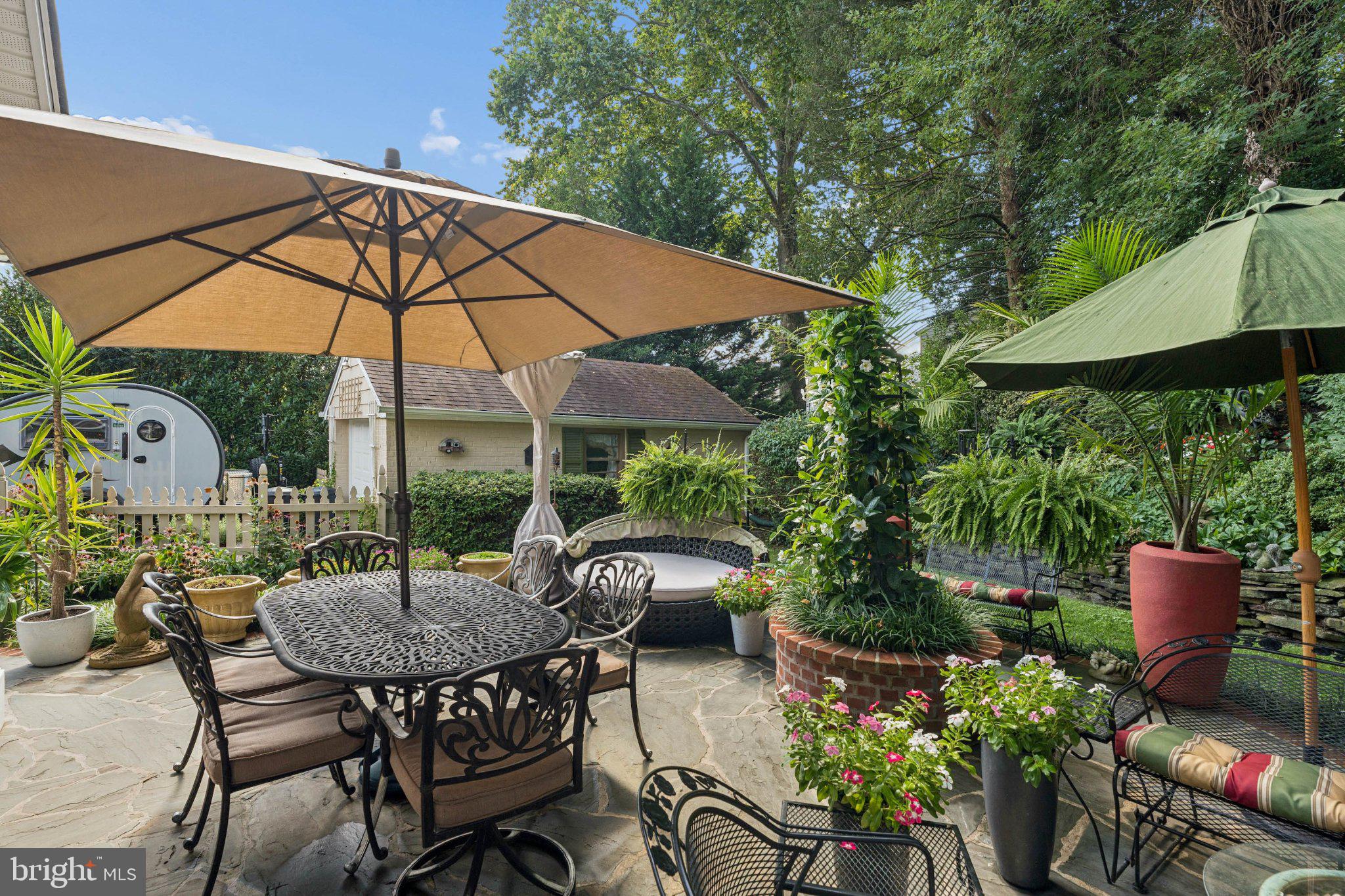 627 Yarmouth Road Baltimore, MD 21286 - Photo 43 of 59 Charming patio oasis in lush greenery.