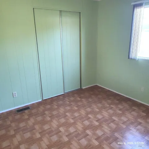 a bathroom with a shower and a toilet