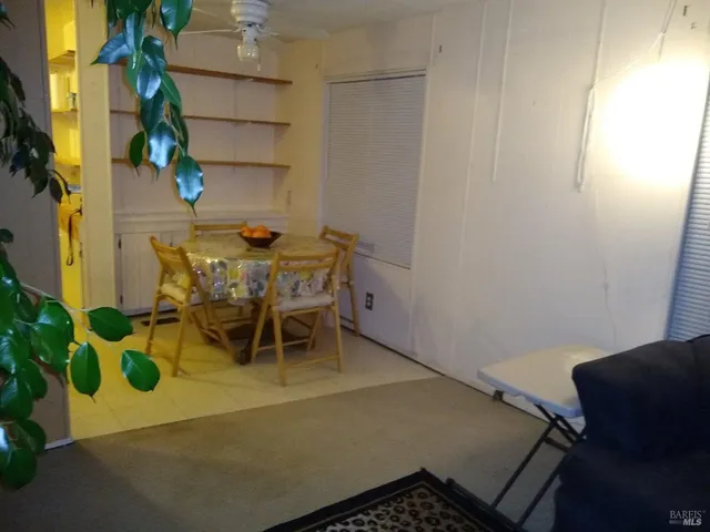 a kitchen with a sink stove and refrigerator