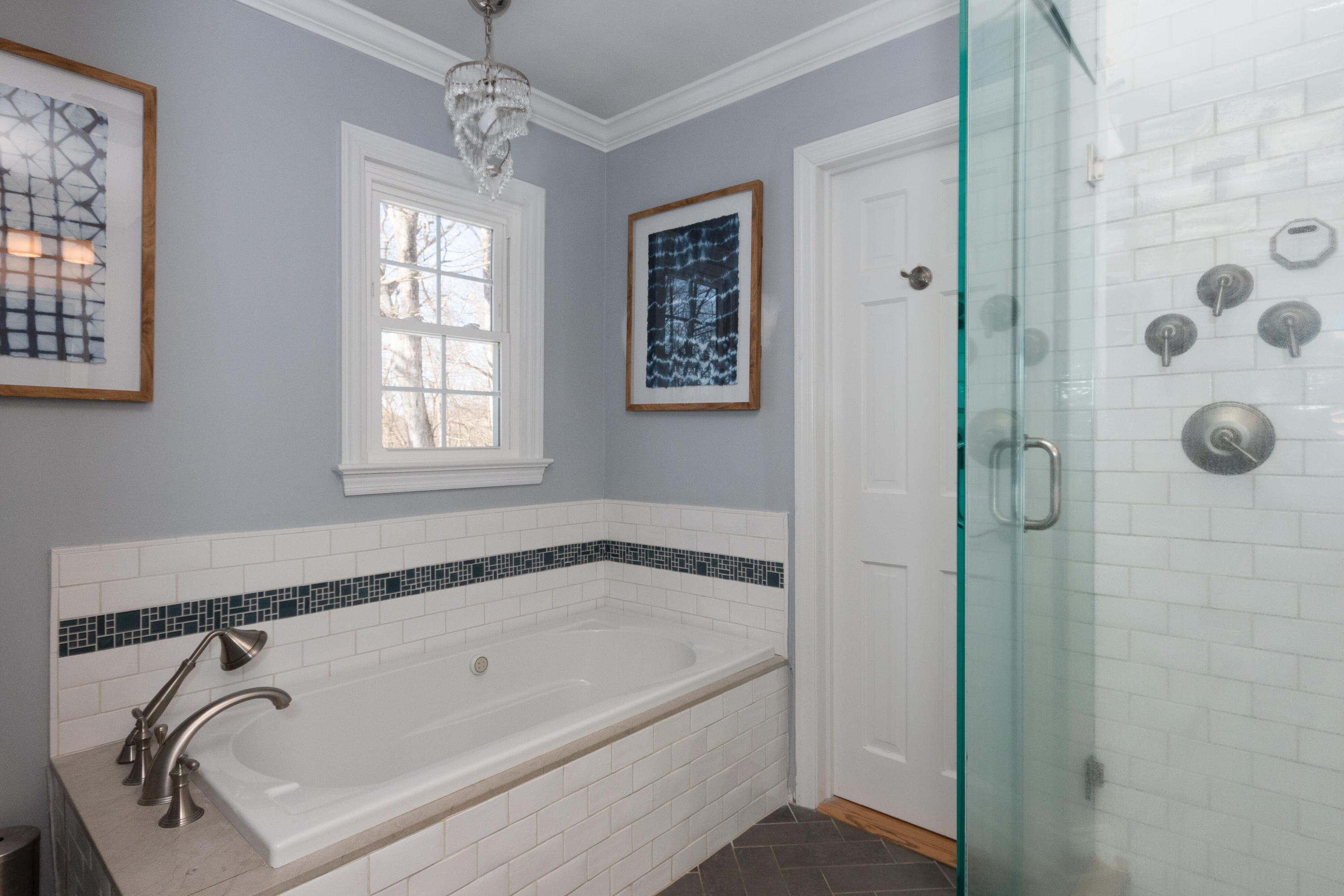 32 Colonial Road New Canaan, CT 06840 - Photo 13 of 22 a bathroom with a tub and a shower