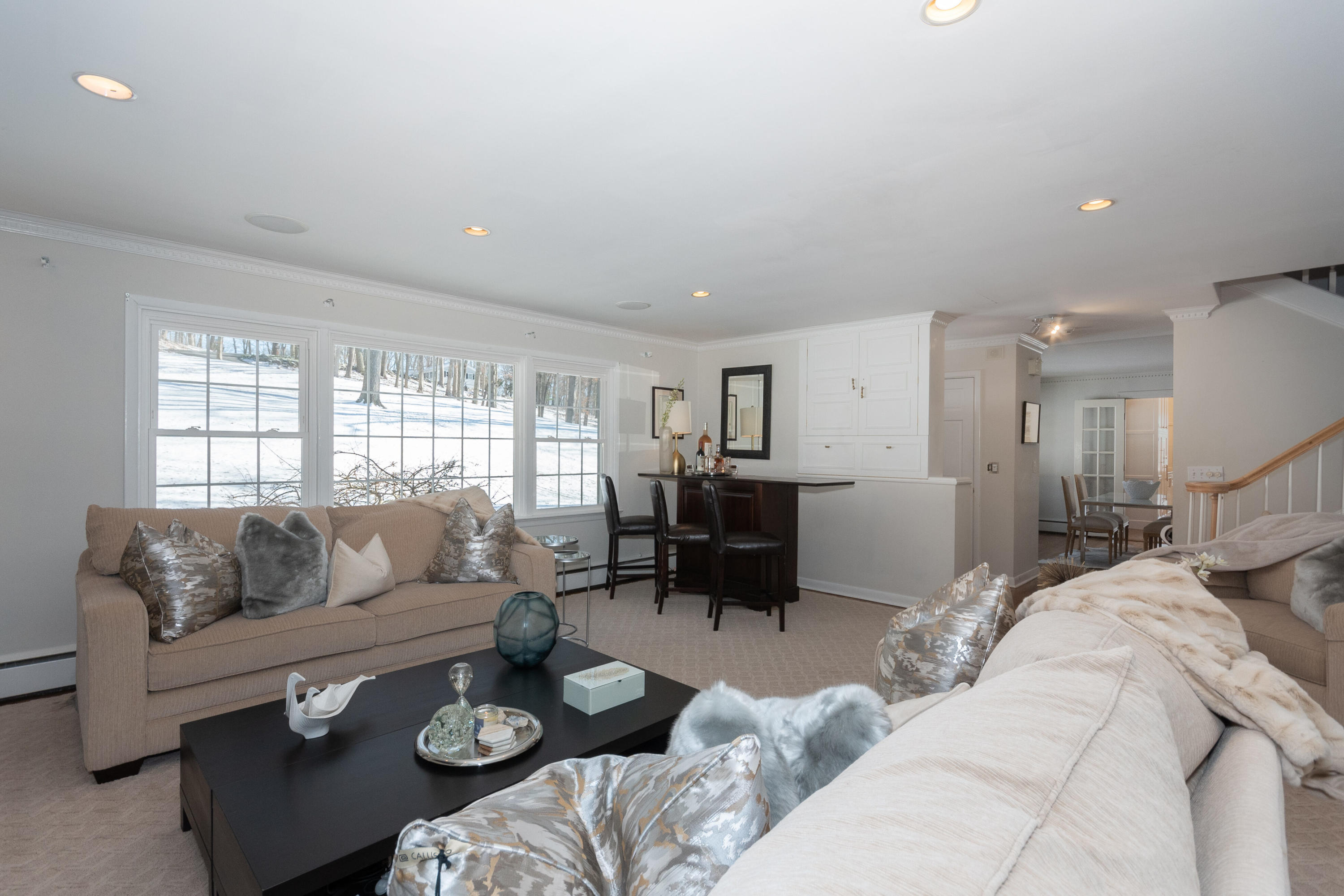 32 Colonial Road New Canaan, CT 06840 - Photo 3 of 22 a living room with furniture and a large window