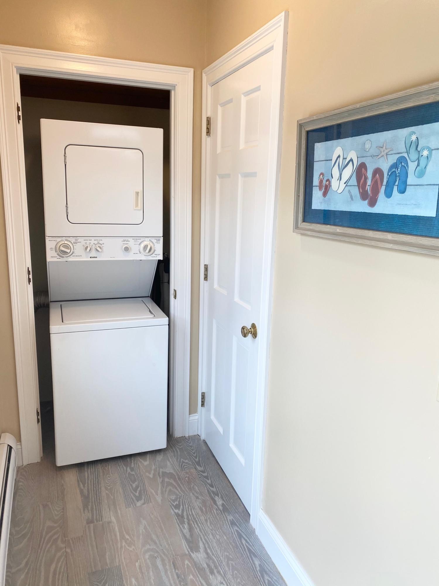 37 Horsefoot Path Dennis, MA 02638 - Photo 16 of 50 a view of a hallway with washer and dryer