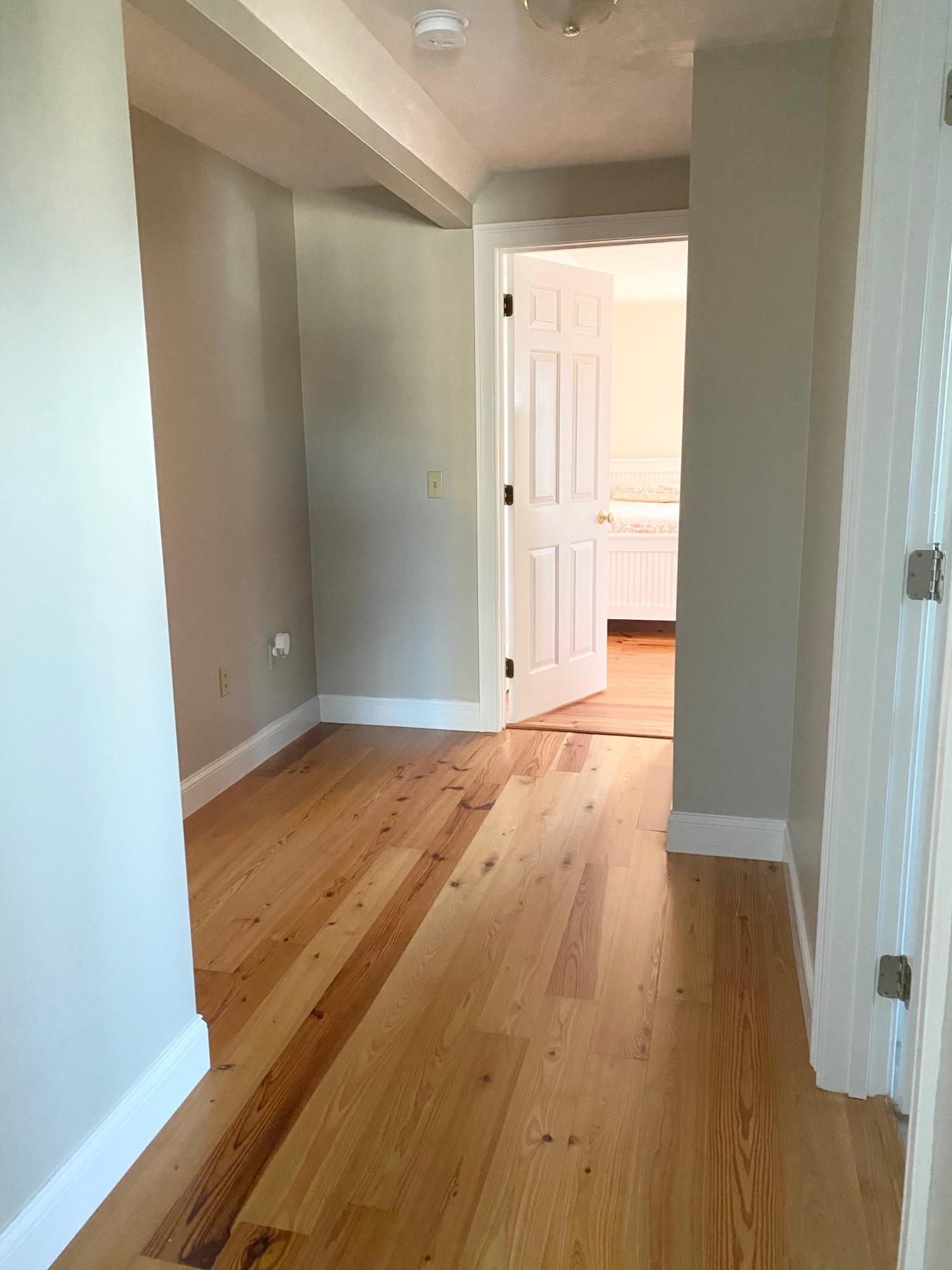 37 Horsefoot Path Dennis, MA 02638 - Photo 18 of 50 an empty room with wooden floor and entrance