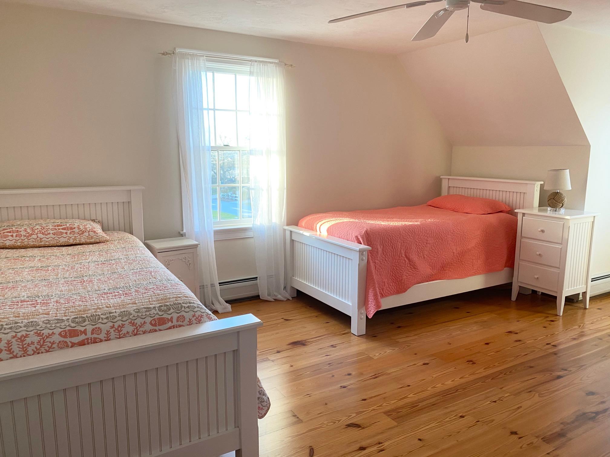 37 Horsefoot Path Dennis, MA 02638 - Photo 21 of 50 a bedroom with a bed and window