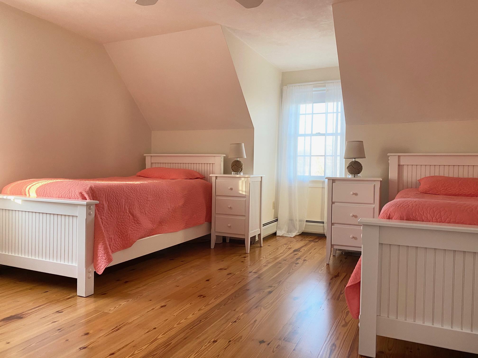 37 Horsefoot Path Dennis, MA 02638 - Photo 22 of 50 a bedroom with a bed and wooden floor