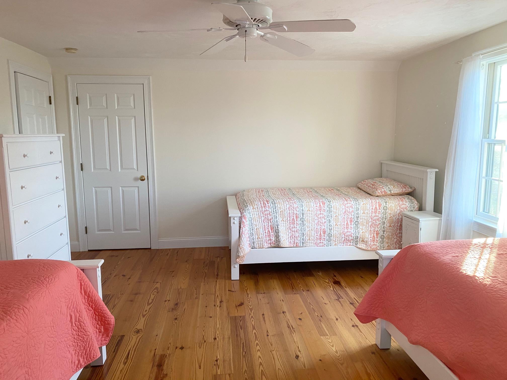 37 Horsefoot Path Dennis, MA 02638 - Photo 23 of 50 a bedroom with a bed and wooden floor