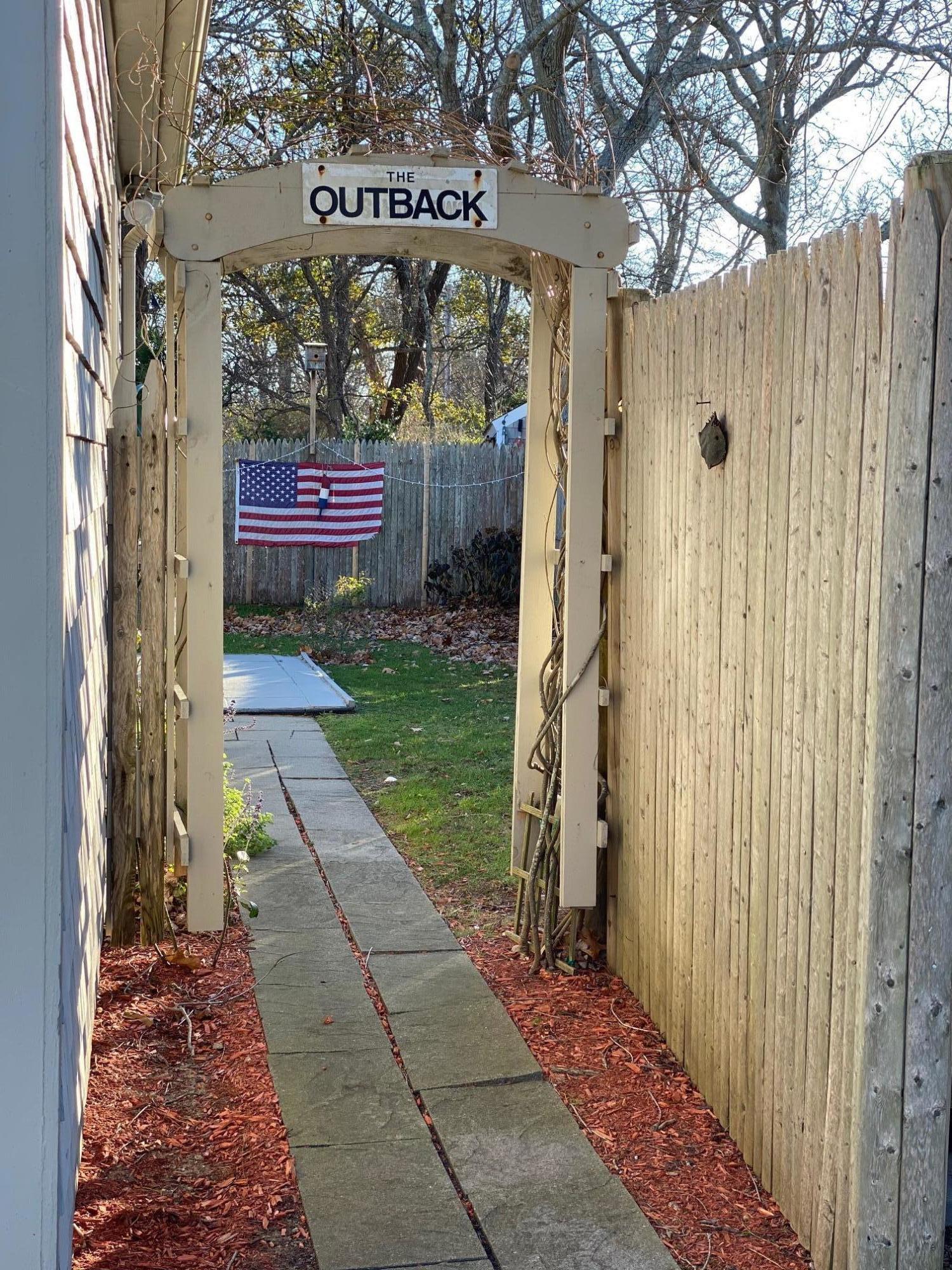 37 Horsefoot Path Dennis, MA 02638 - Photo 27 of 50 a view of a pathway door with an outdoor space