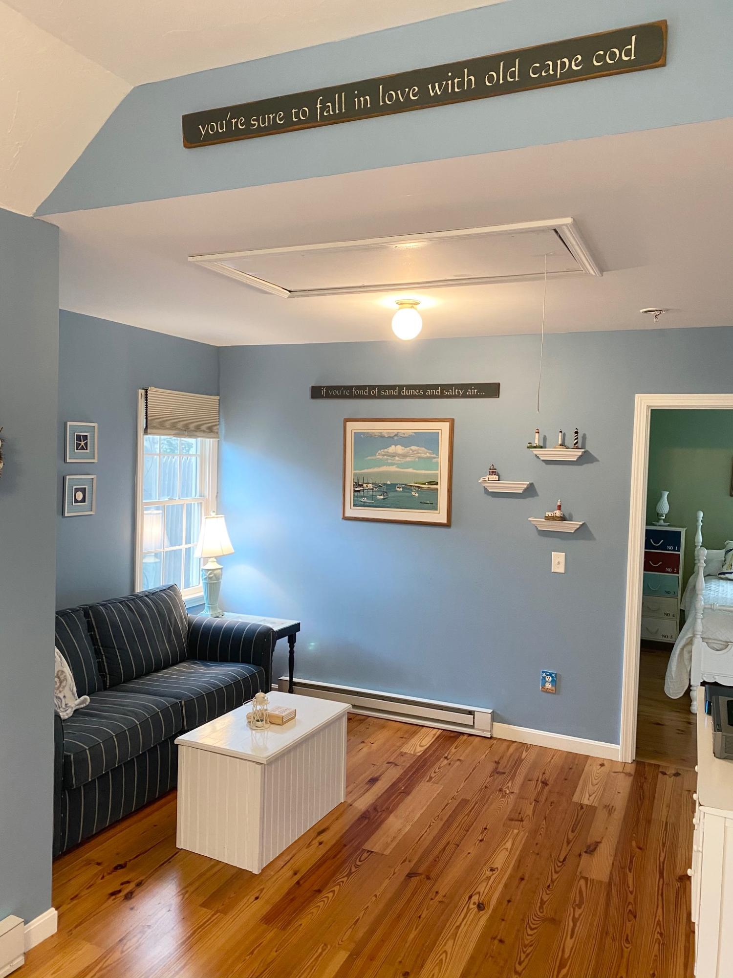 37 Horsefoot Path Dennis, MA 02638 - Photo 32 of 50 a living room with furniture and wooden floor