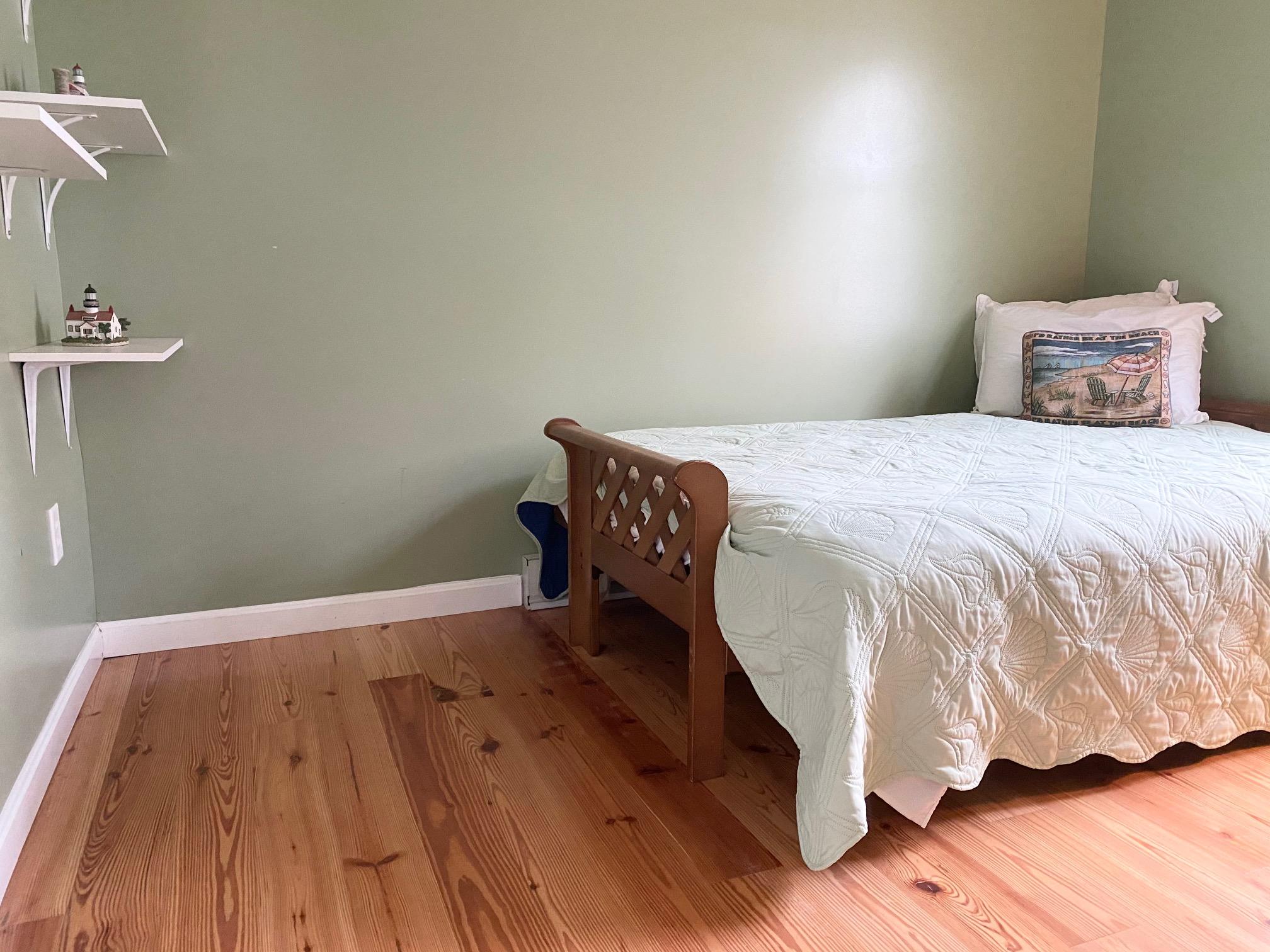 37 Horsefoot Path Dennis, MA 02638 - Photo 34 of 50 a bedroom with a bed and wooden floor