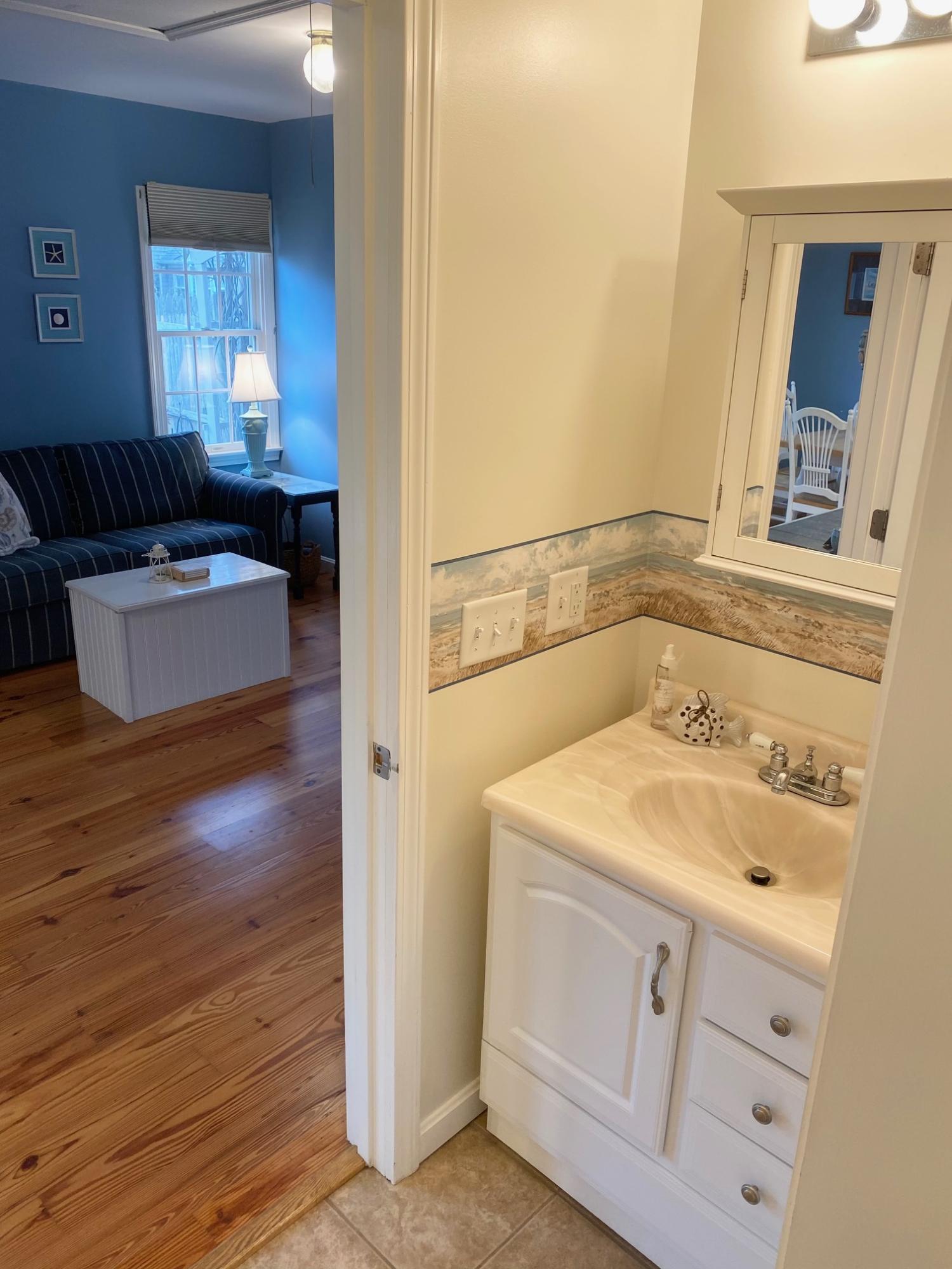 37 Horsefoot Path Dennis, MA 02638 - Photo 36 of 50 a bathroom with a sink and a mirror