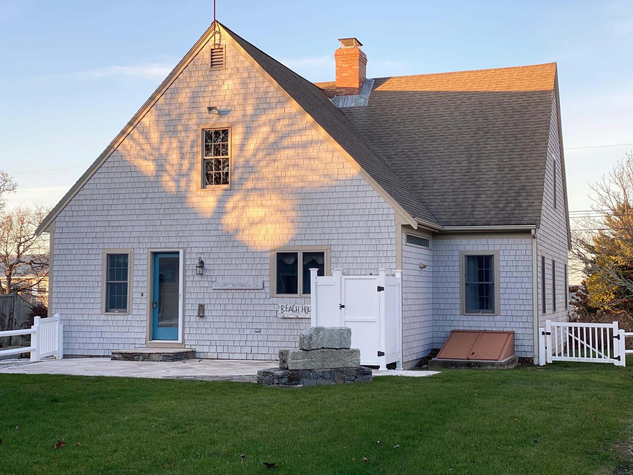 37 Horsefoot Path Dennis, MA 02638 - Photo 46 of 50 a front view of a house with a yard and garage