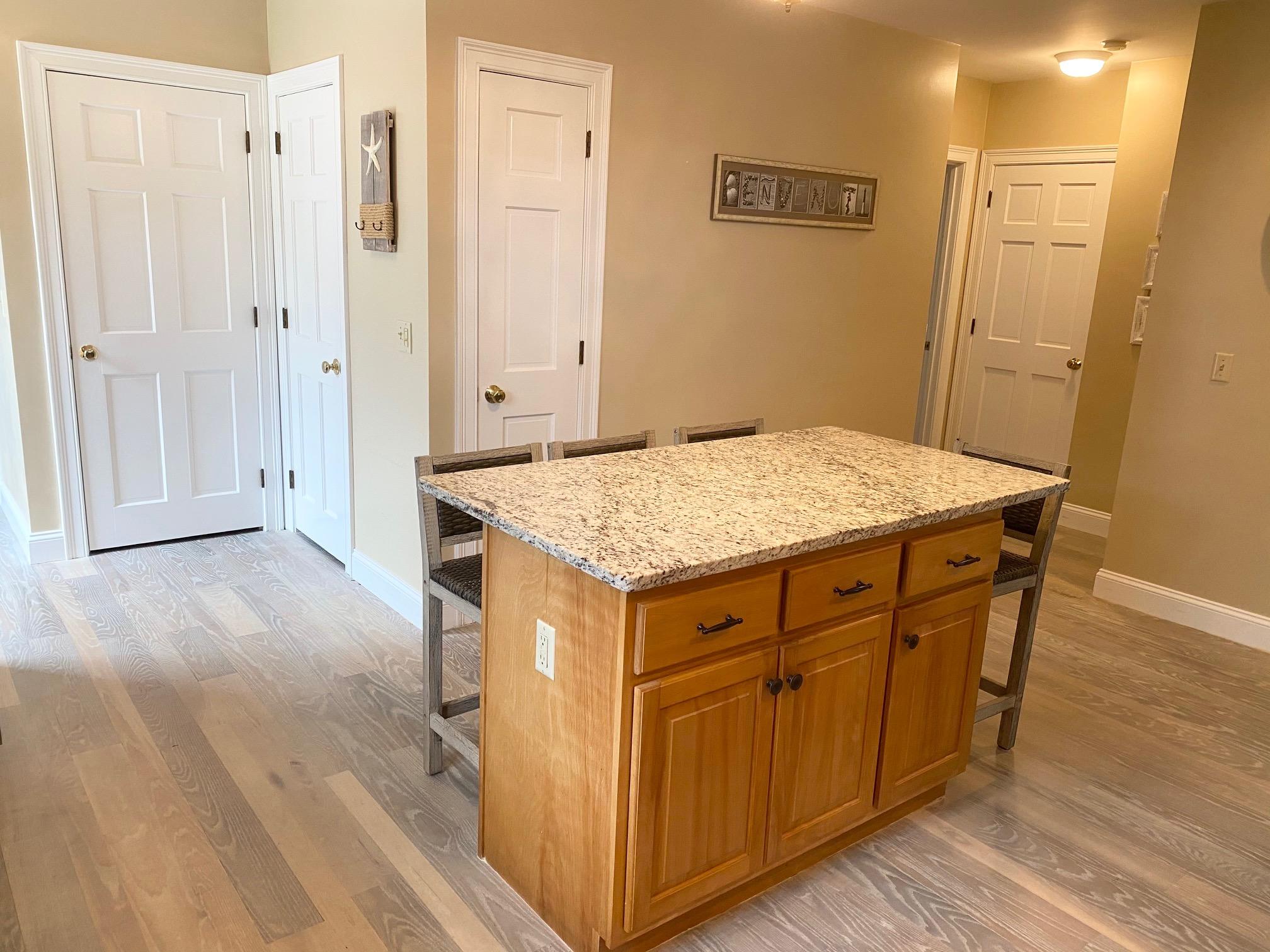 37 Horsefoot Path Dennis, MA 02638 - Photo 9 of 50 a utility room with wooden floor