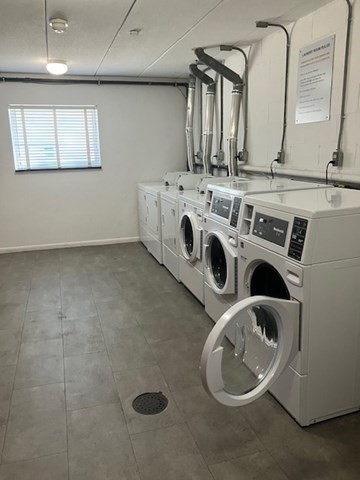 763 Main Street, Unit 44 Waltham, MA 02451 - Photo 11 of 11 a utility room with dryer and washer