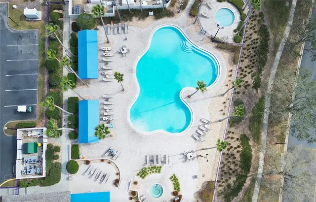 an aerial view of a swimming pool