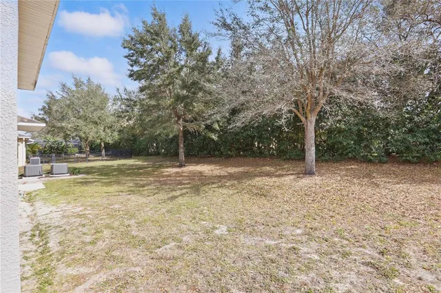 a view of a backyard with a garden