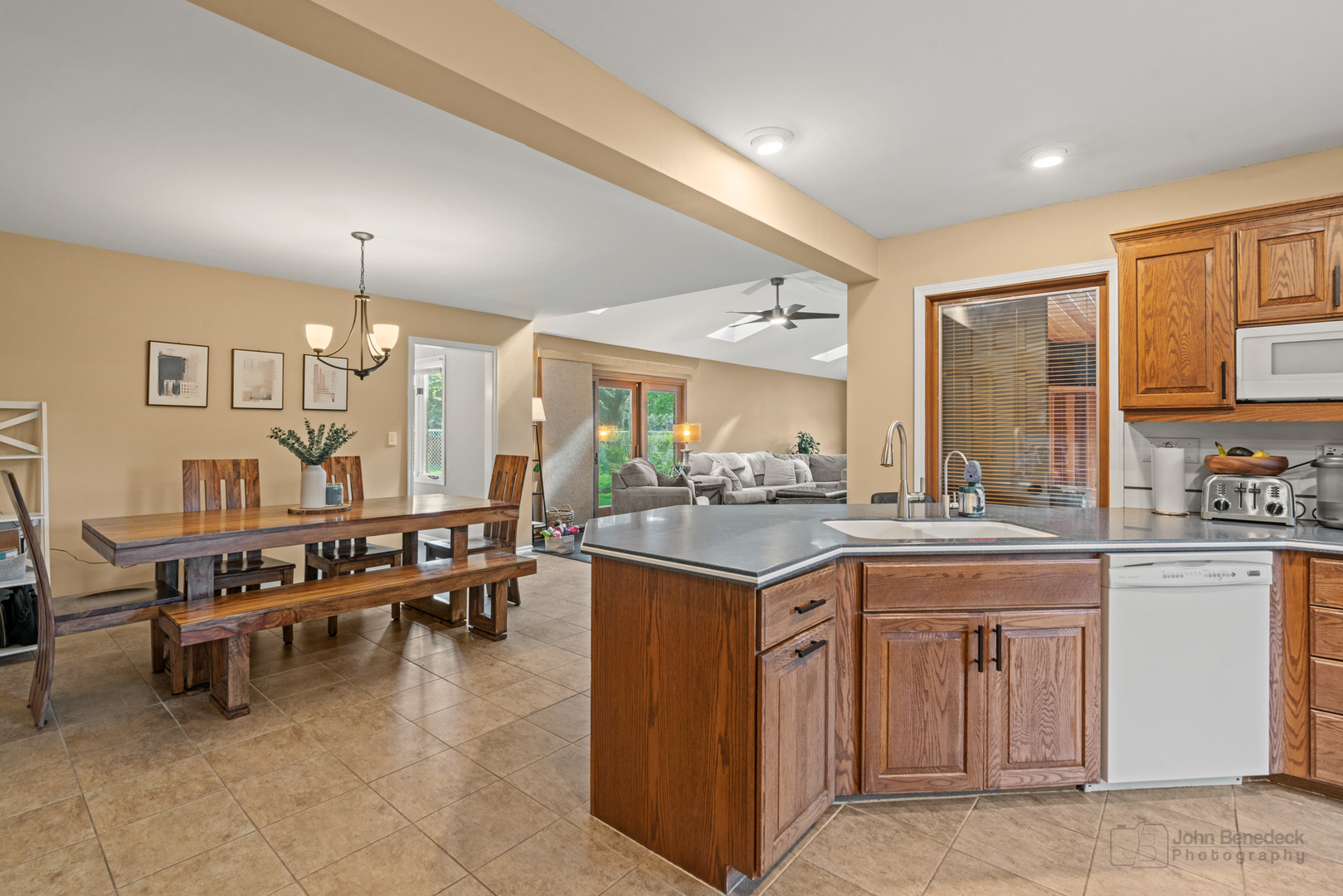 1223 Itasca Road Addison, IL 60101 - Photo 13 of 42 a kitchen with lots of counter and chairs