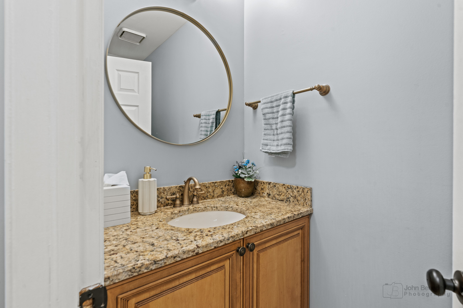 1223 Itasca Road Addison, IL 60101 - Photo 21 of 42 a bathroom with a granite countertop sink and a mirror