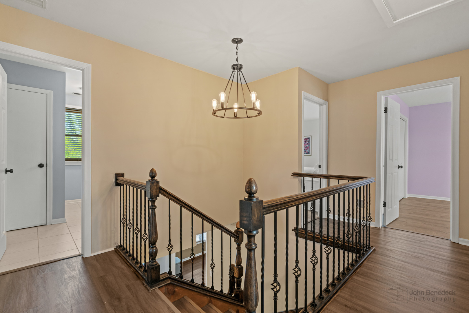 1223 Itasca Road Addison, IL 60101 - Photo 23 of 42 a view of a hallway with wooden floor and windows