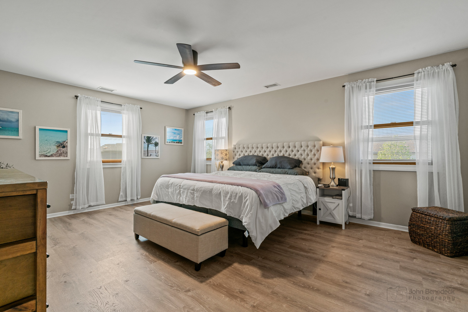 1223 Itasca Road Addison, IL 60101 - Photo 24 of 42 a spacious bedroom with a bed and a flat screen tv