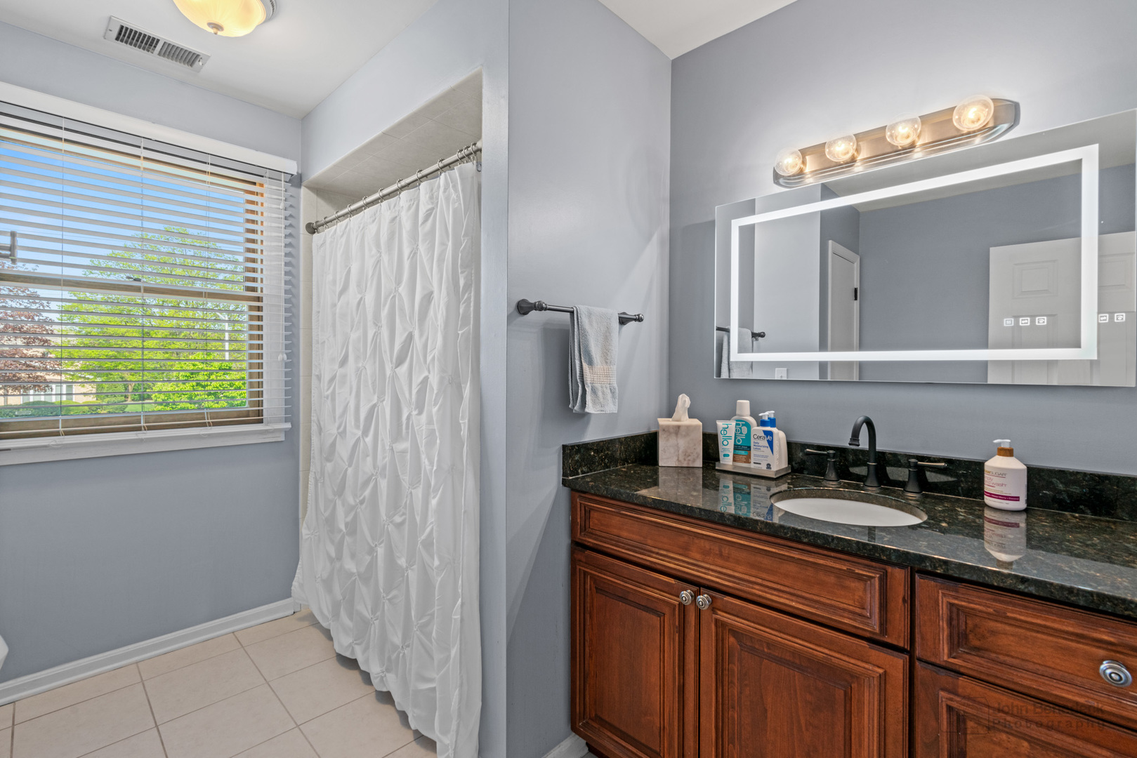 1223 Itasca Road Addison, IL 60101 - Photo 30 of 42 a kitchen with a sink and cabinets