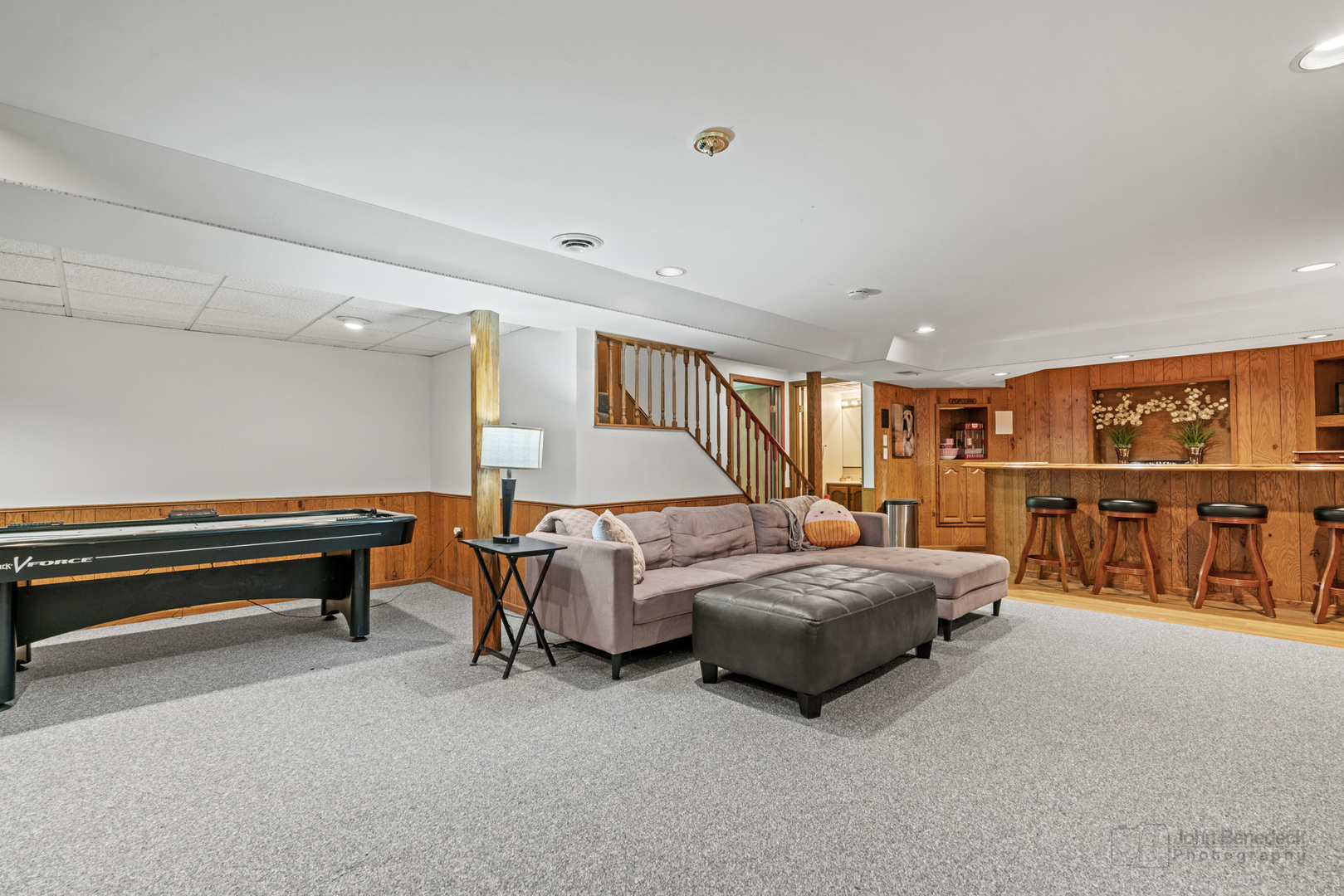 1223 Itasca Road Addison, IL 60101 - Photo 31 of 42 a living room with a bed furniture and a lamp