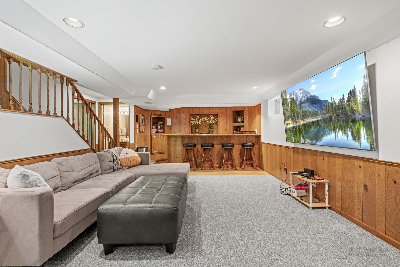 1223 Itasca Road Addison, IL 60101 - Photo 32 of 42 a living room with furniture and a flat screen tv