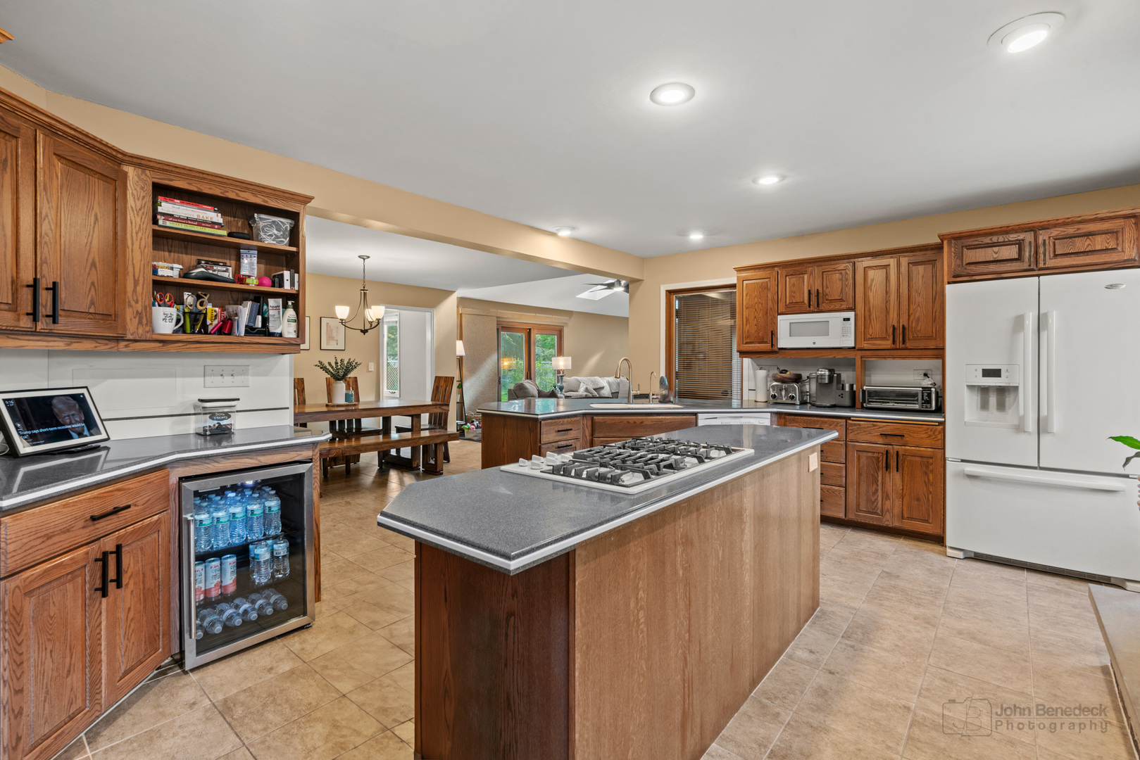 1223 Itasca Road Addison, IL 60101 - Photo 10 of 42 a kitchen with stainless steel appliances granite countertop a stove top oven a sink dishwasher and a refrigerator