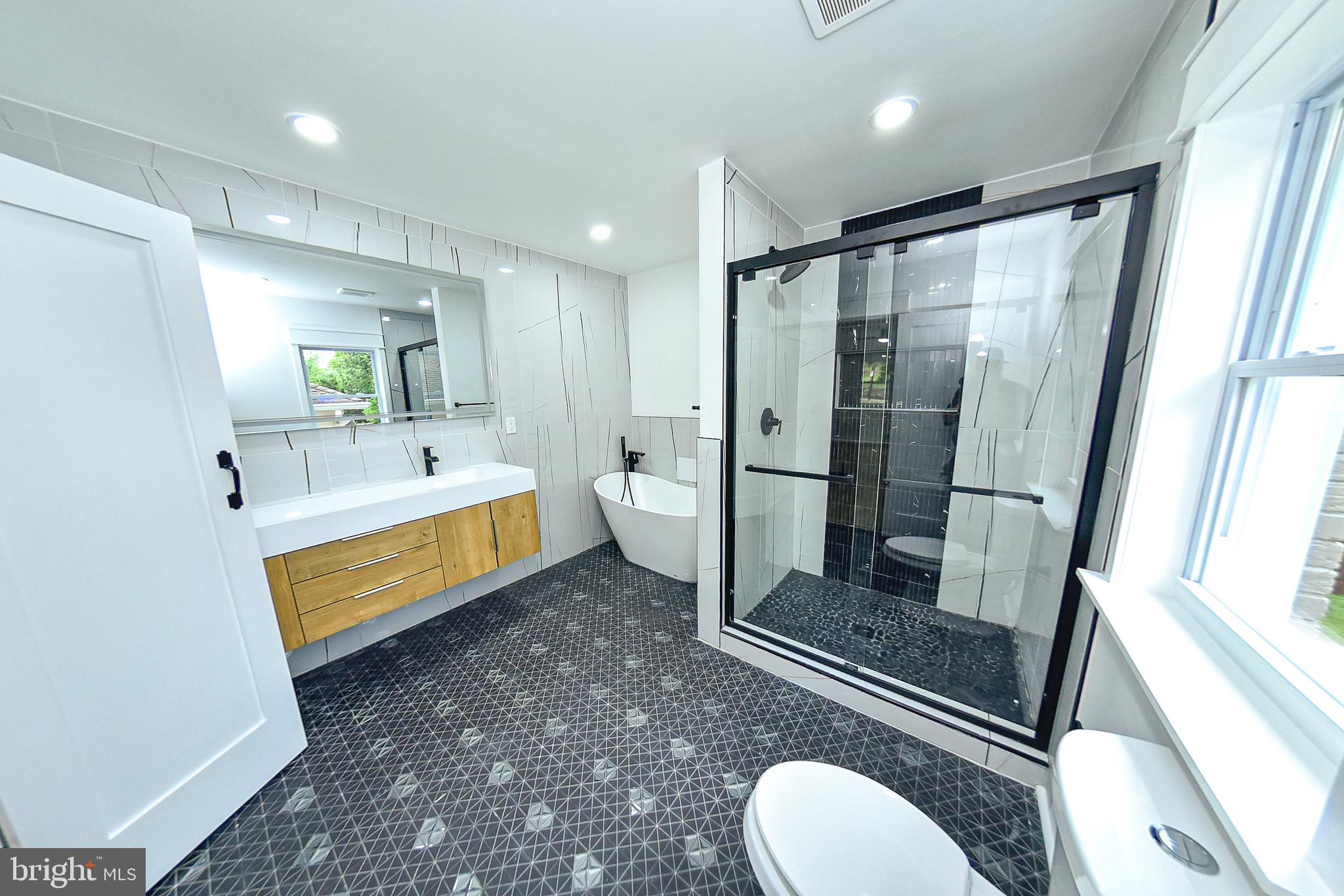 3704 Suitland Road Southeast Washington, DC 20020 - Photo 53 of 70 Sleek modern bathroom oasis.