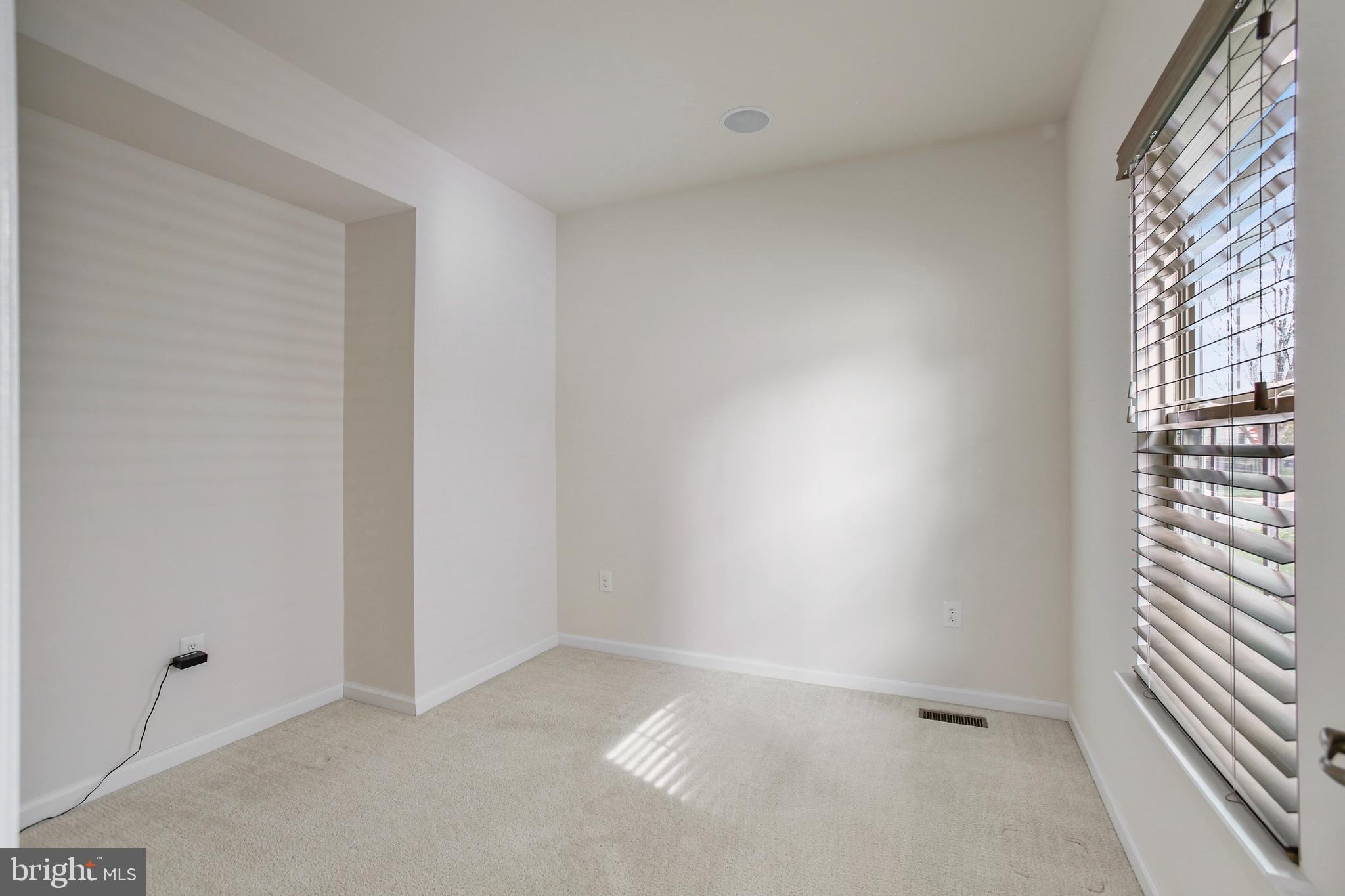 41597 Hoffman Drive Aldie, VA 20105 - Photo 15 of 42 a view of an empty room with a window