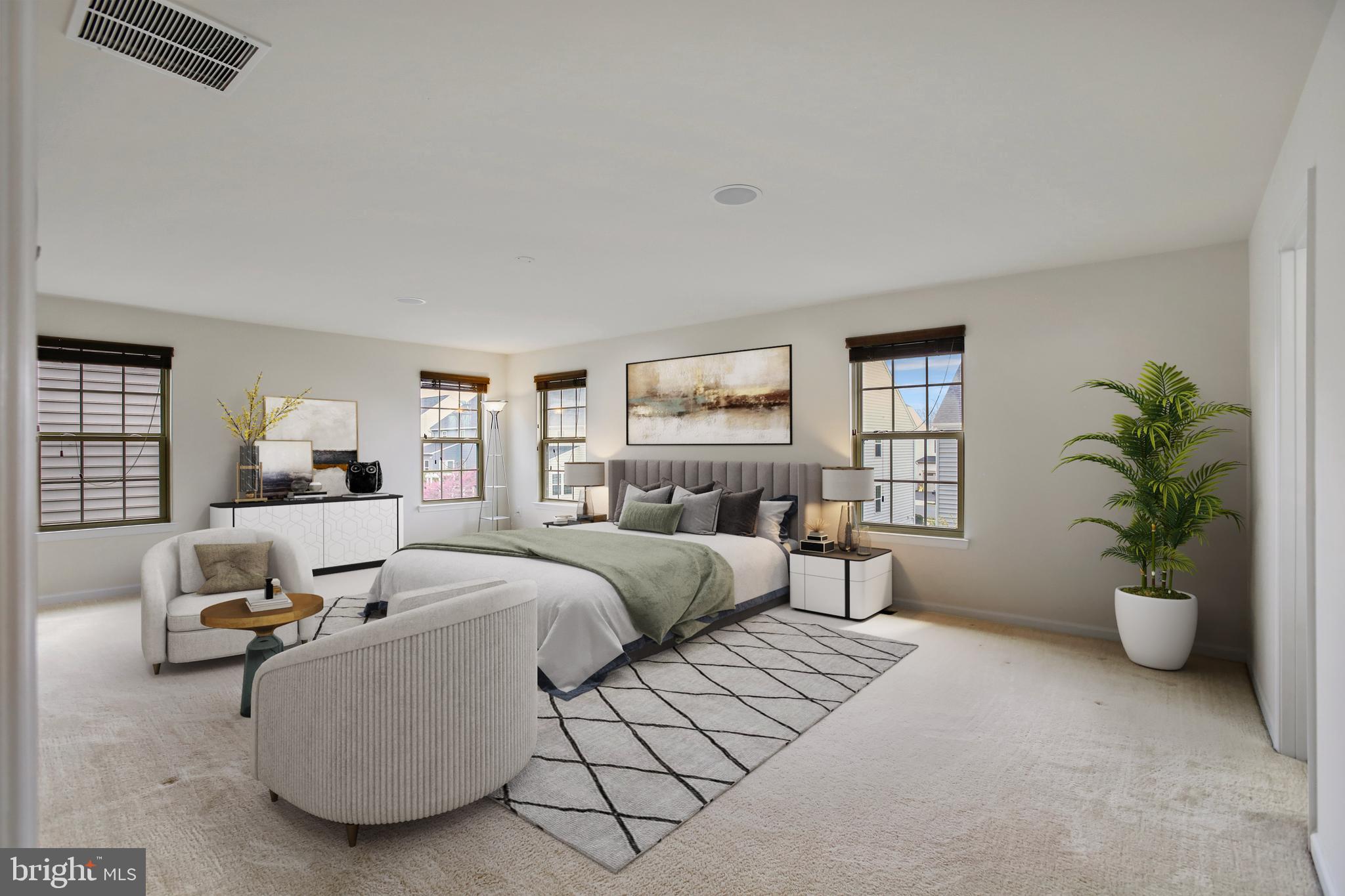 41597 Hoffman Drive Aldie, VA 20105 - Photo 20 of 42 a living room with furniture and a potted plant