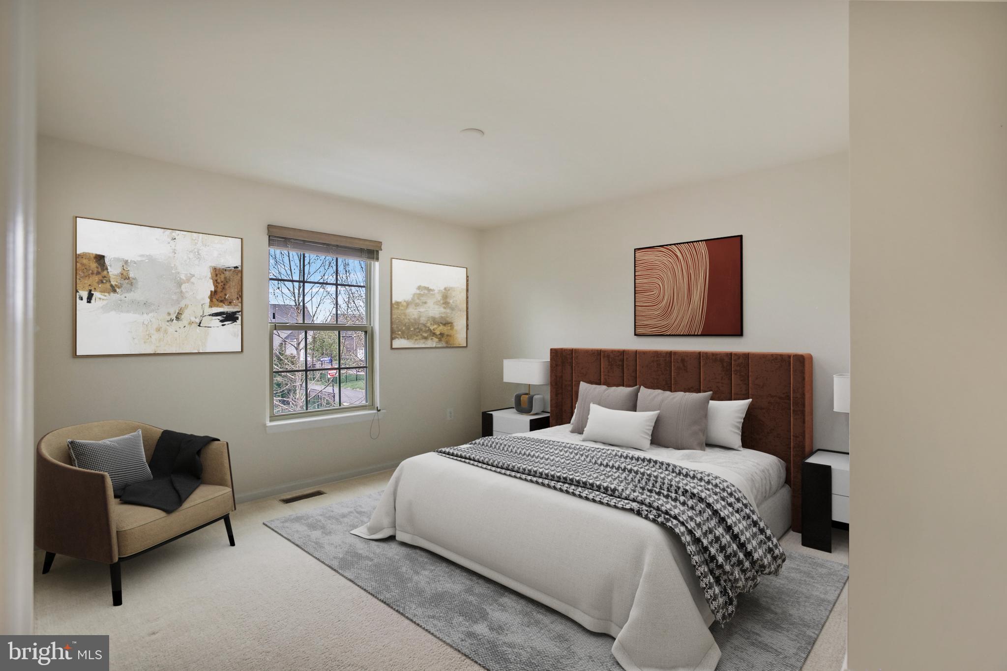 41597 Hoffman Drive Aldie, VA 20105 - Photo 29 of 42 a bedroom with a bed couch and window