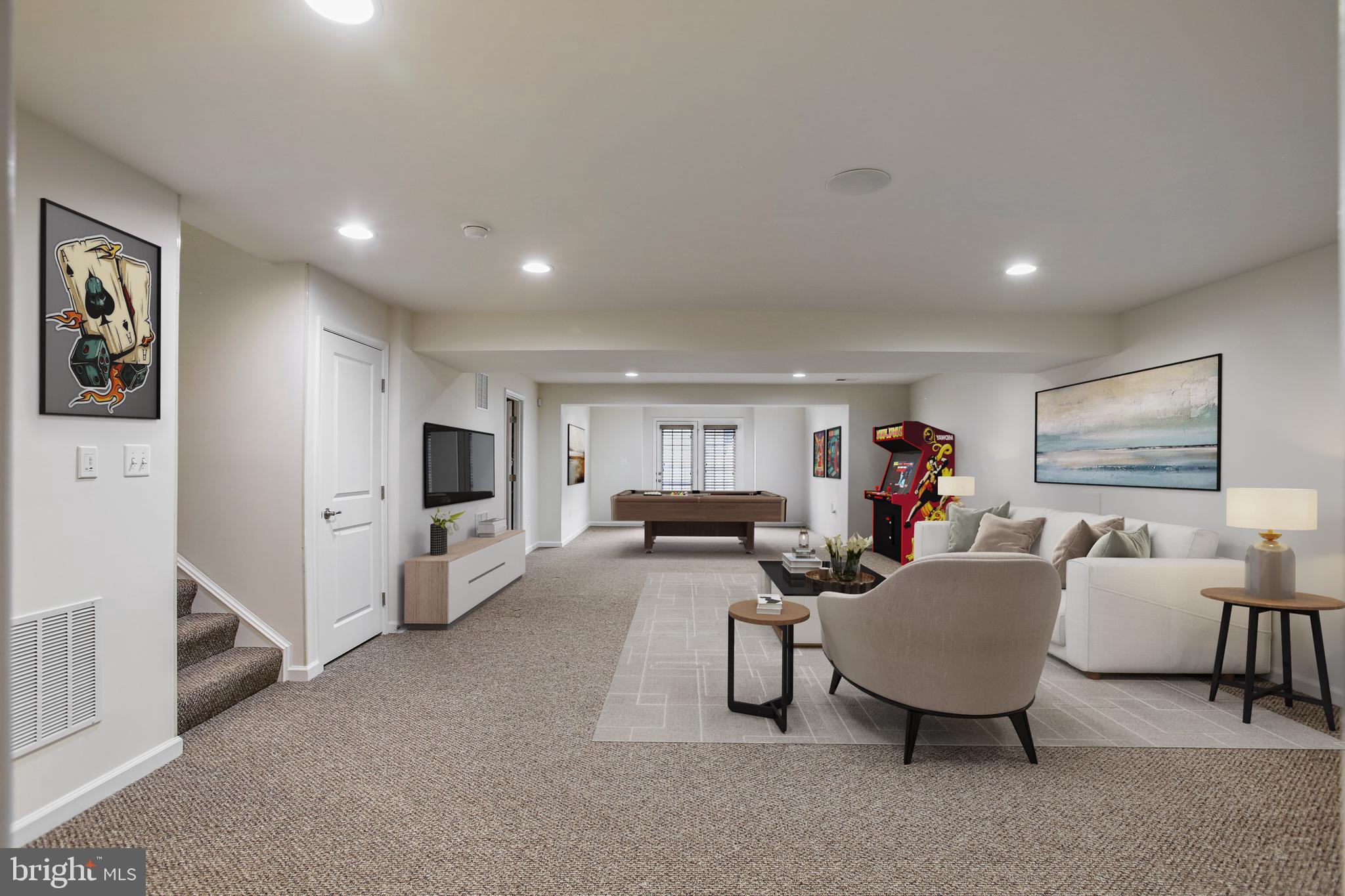 41597 Hoffman Drive Aldie, VA 20105 - Photo 34 of 42 a living room with furniture and a flat screen tv