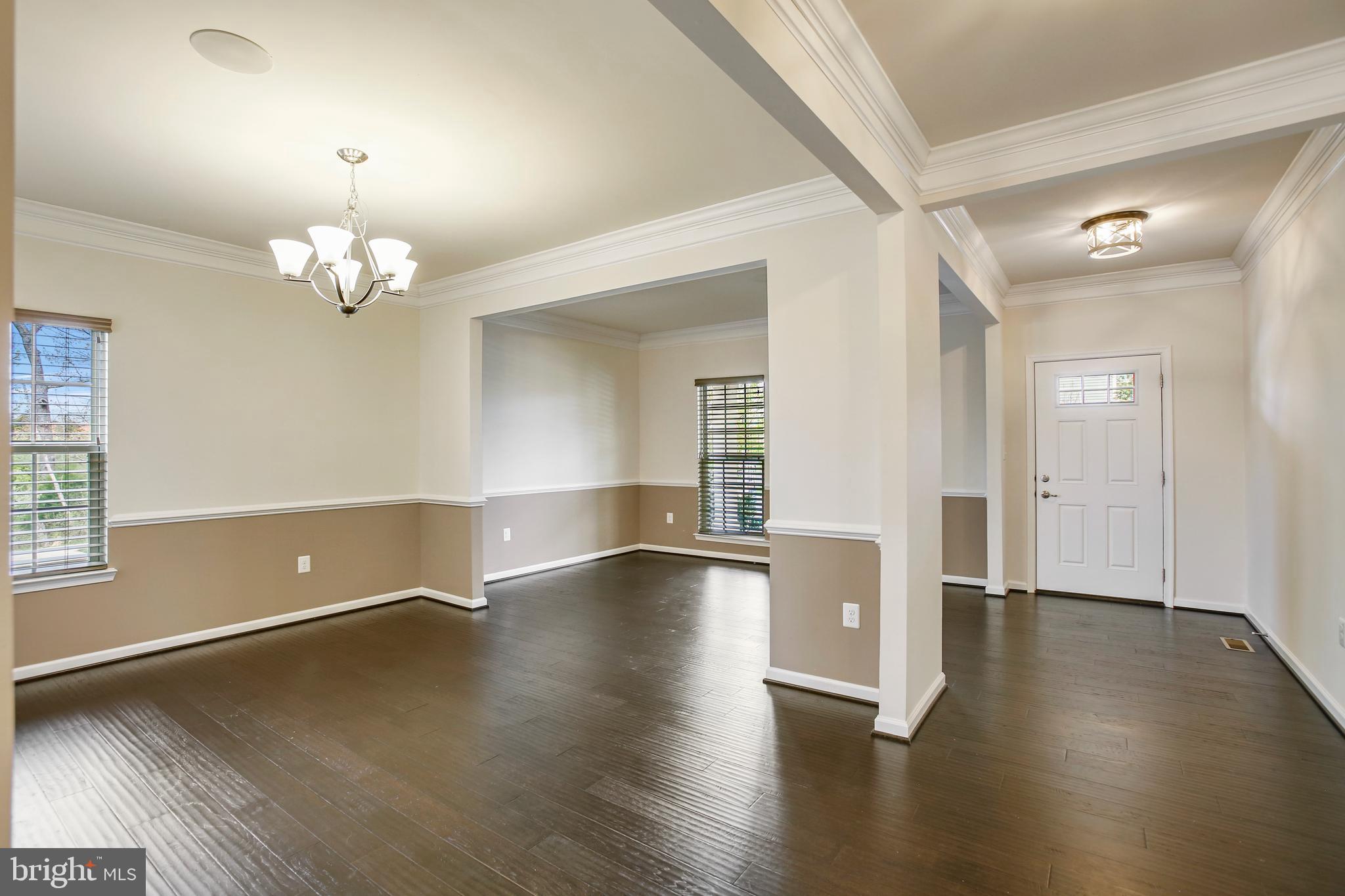 41597 Hoffman Drive Aldie, VA 20105 - Photo 4 of 42 wooden floor in an empty room with a window