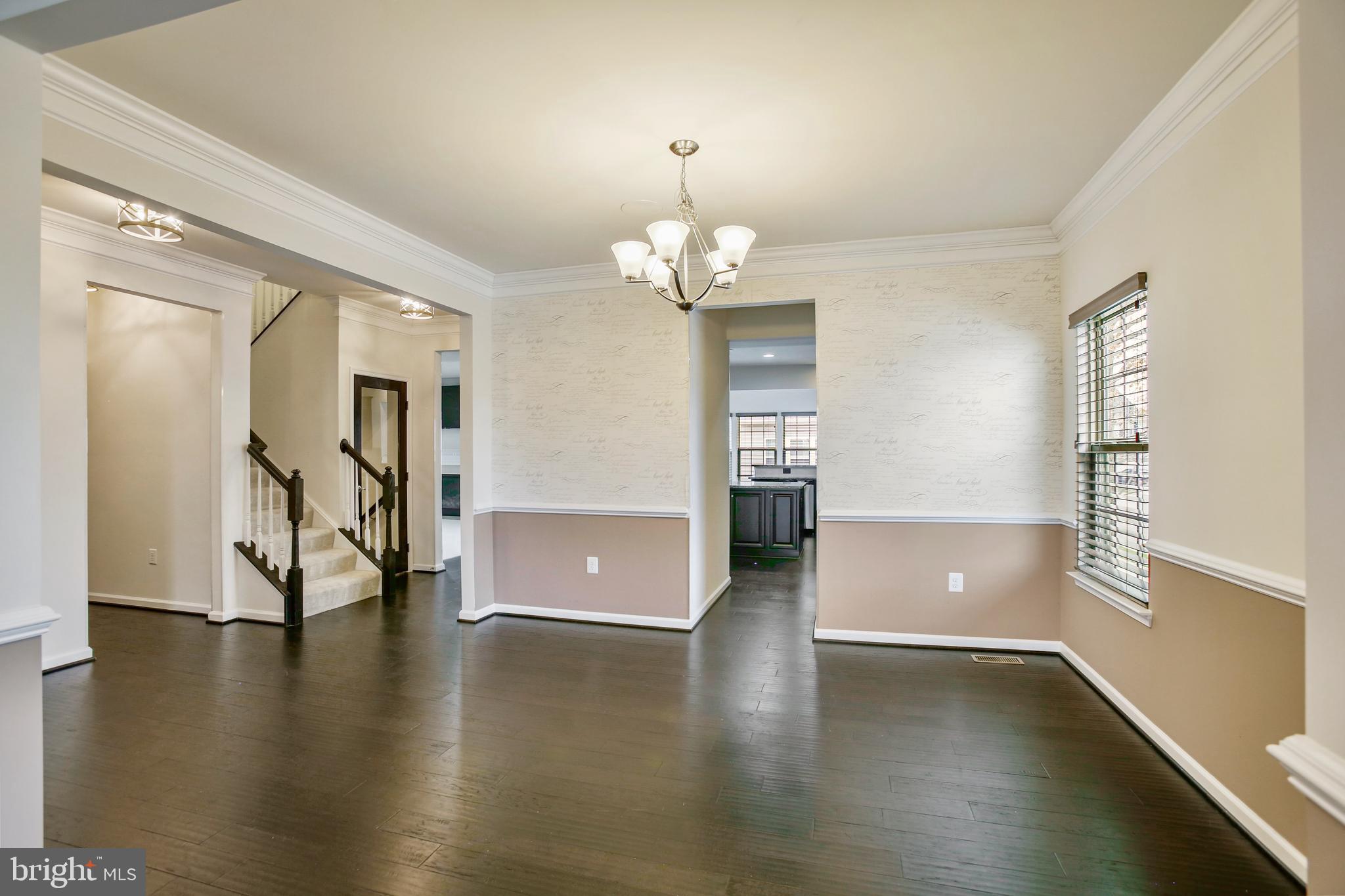 41597 Hoffman Drive Aldie, VA 20105 - Photo 5 of 42 wooden floor in an empty room with a window