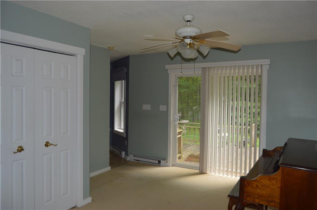 3244 Maple Lane Jamestown, PA 16134 - Photo 6 of 27 a view of a livingroom with a chandelier furniture and windows