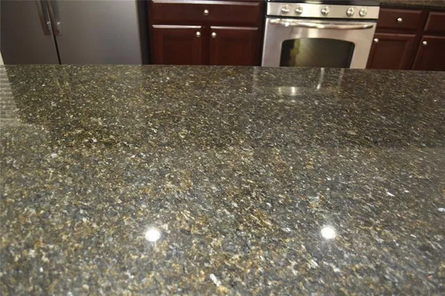 a view of a room with wooden floor and staircase