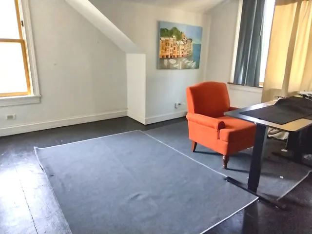 a room with furniture and window