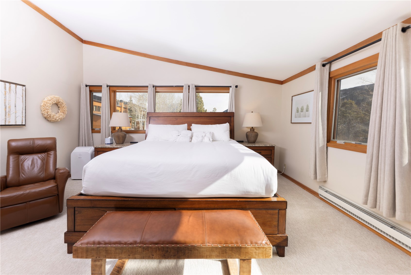 590 Tennis Club Road, Unit 1336 Keystone, CO 80435 - Photo 17 of 41 a bedroom with a bed and wooden floor