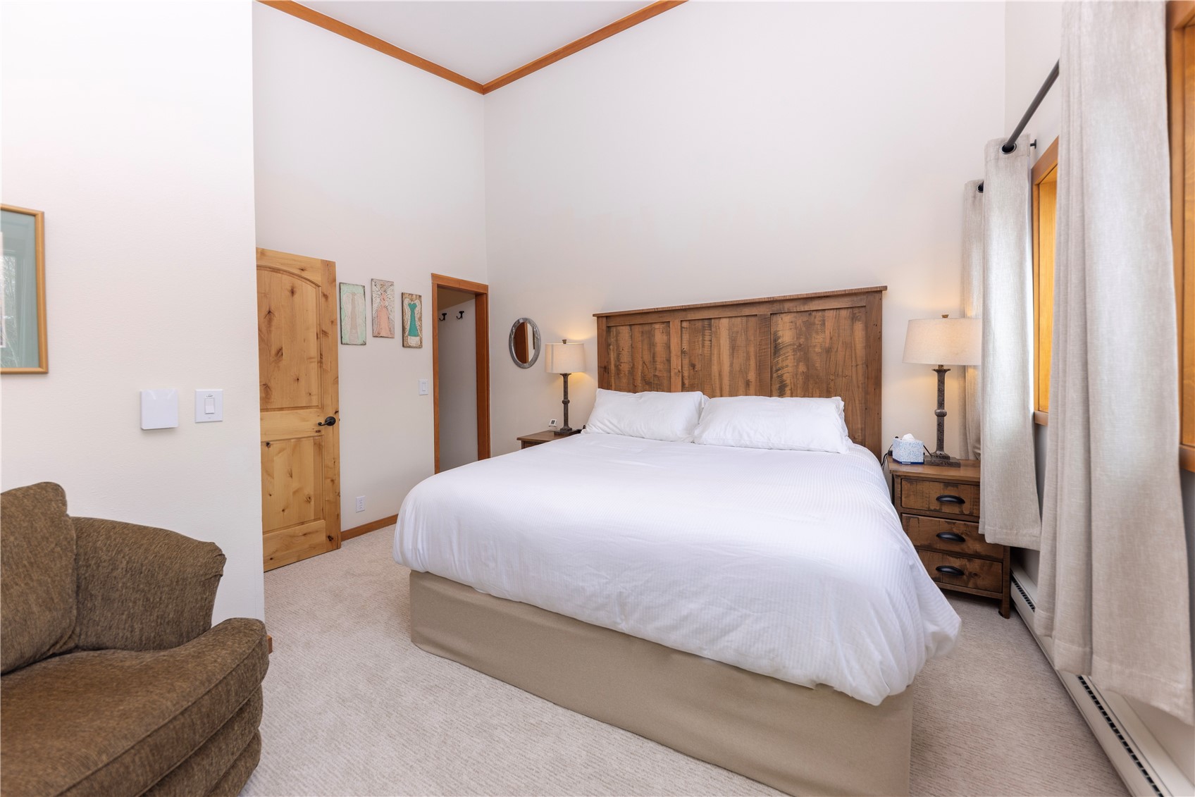 590 Tennis Club Road, Unit 1336 Keystone, CO 80435 - Photo 24 of 41 a bedroom with a bed couch and a window