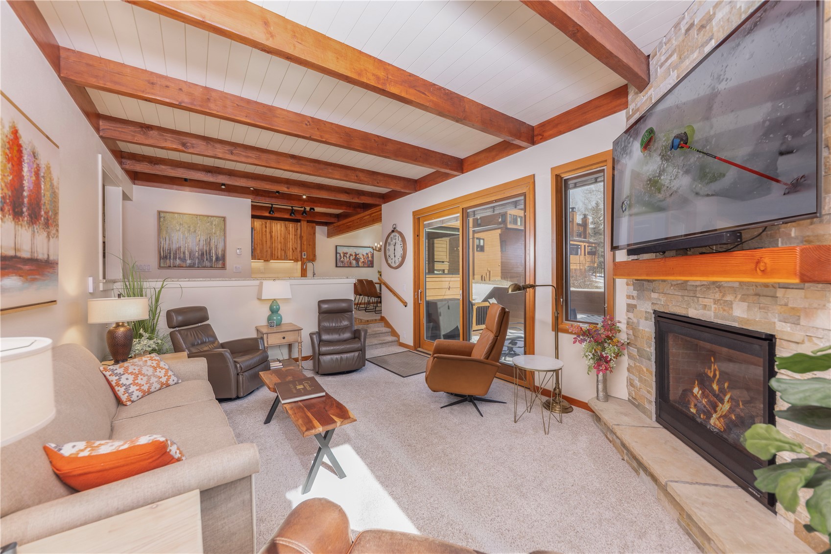 590 Tennis Club Road, Unit 1336 Keystone, CO 80435 - Photo 3 of 41 a living room with furniture a fireplace and city view