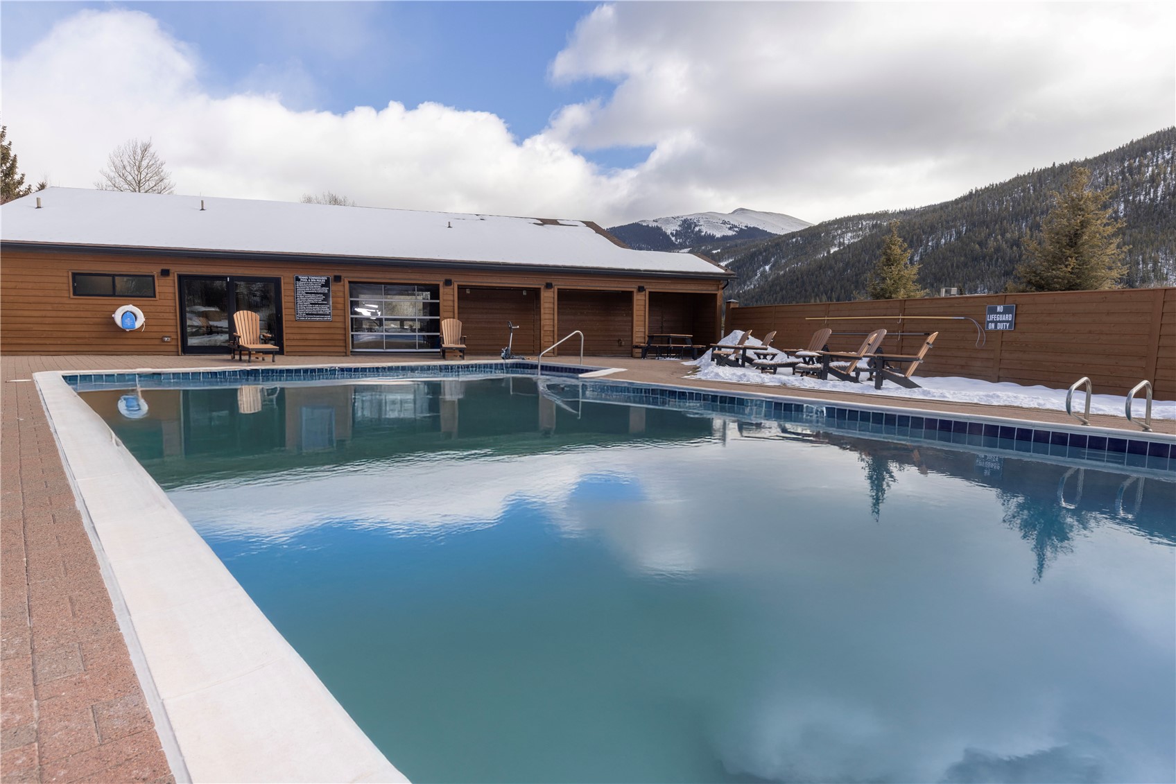 590 Tennis Club Road, Unit 1336 Keystone, CO 80435 - Photo 33 of 41 a view of a lake with a house in the background