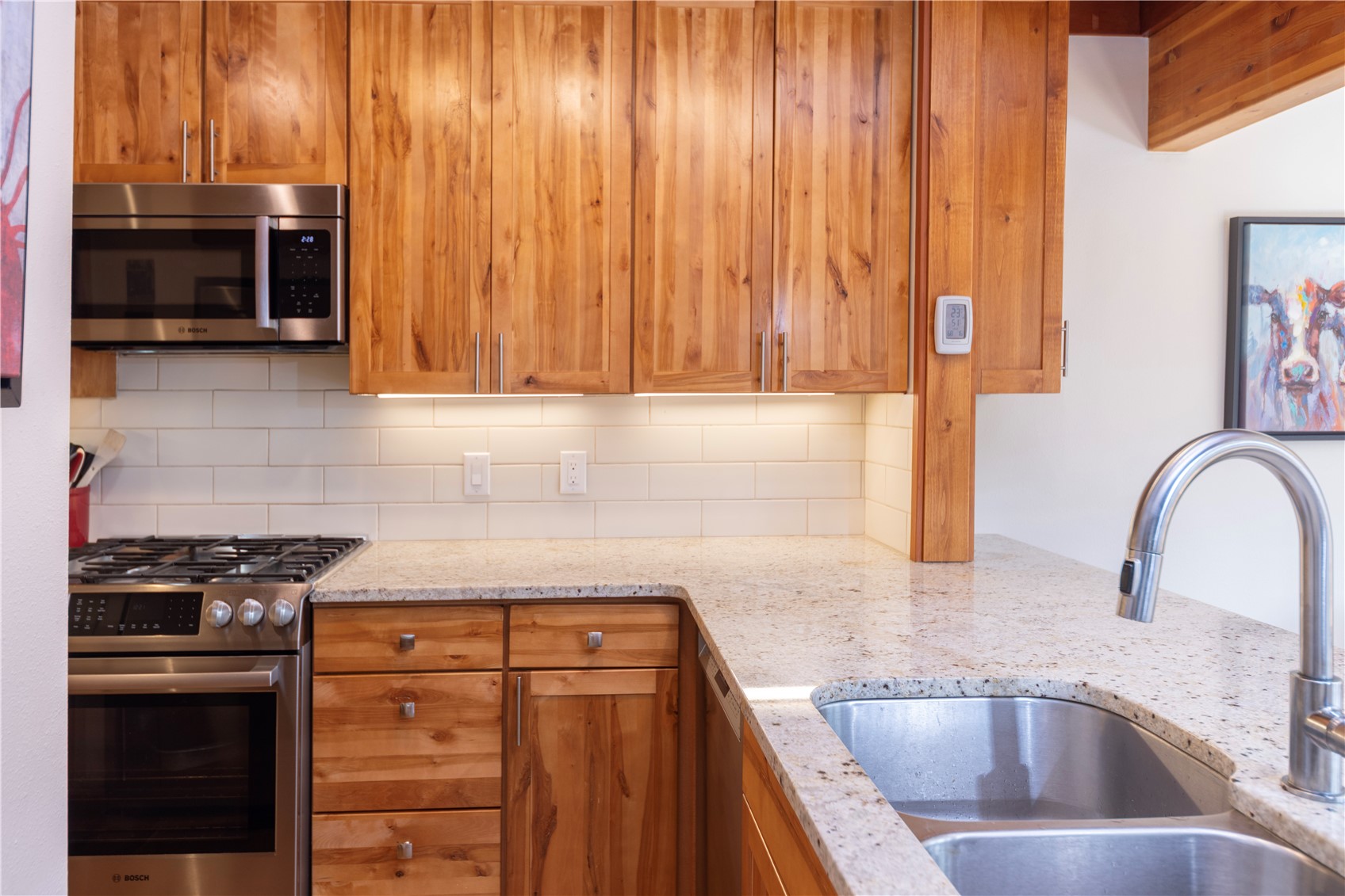590 Tennis Club Road, Unit 1336 Keystone, CO 80435 - Photo 8 of 41 a kitchen with granite countertop a sink stainless steel appliances and cabinets