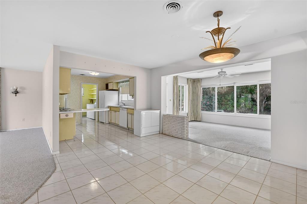 450 Northwest 12th Avenue Boca Raton, FL 33486 - Photo 12 of 58 a view of a kitchen with furniture and a window