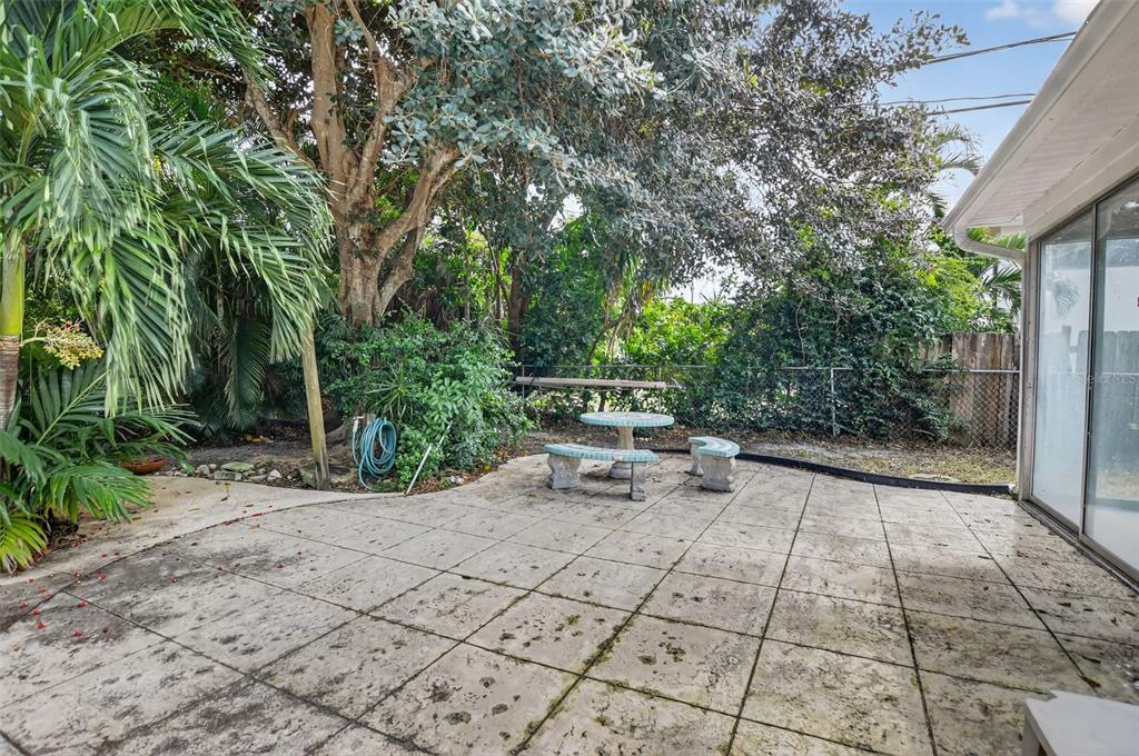450 Northwest 12th Avenue Boca Raton, FL 33486 - Photo 35 of 58 a view of a terrace with chairs