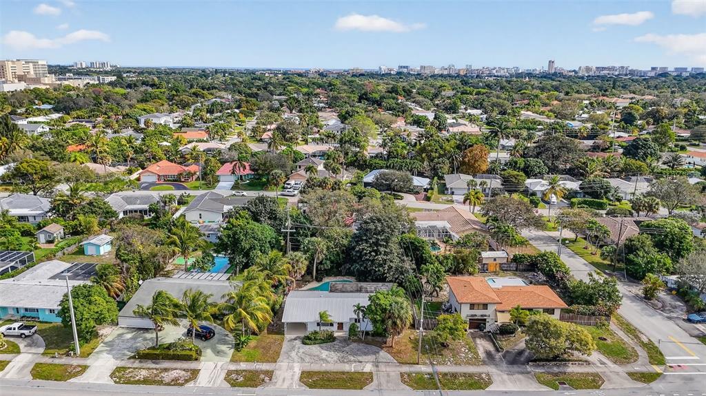 450 Northwest 12th Avenue Boca Raton, FL 33486 - Photo 44 of 58 an aerial view of residential houses with outdoor space
