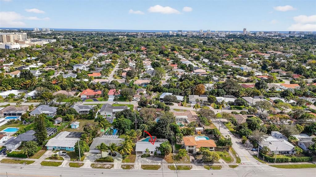450 Northwest 12th Avenue Boca Raton, FL 33486 - Photo 45 of 58 an aerial view of residential houses with outdoor space